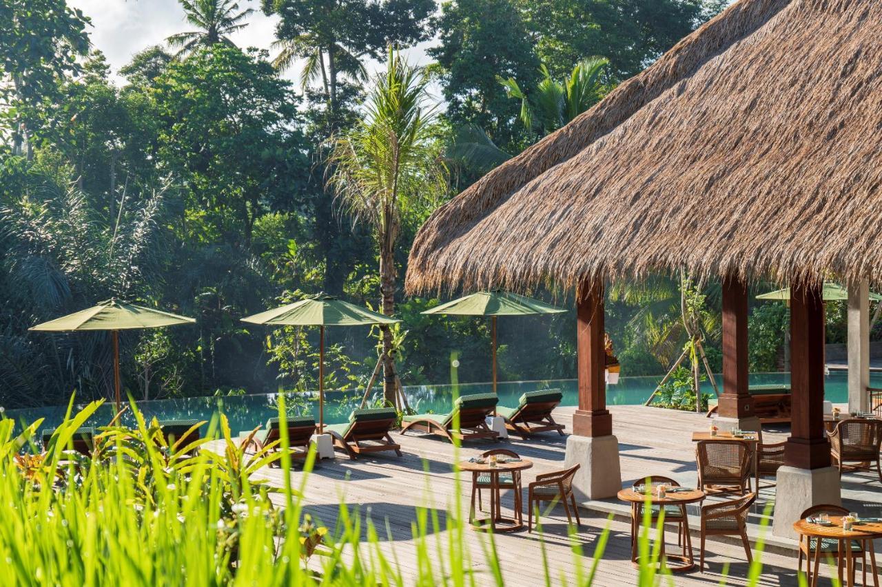 Hotel Adiwana Suweta Ubud Exterior foto The swimming pool at the hotel