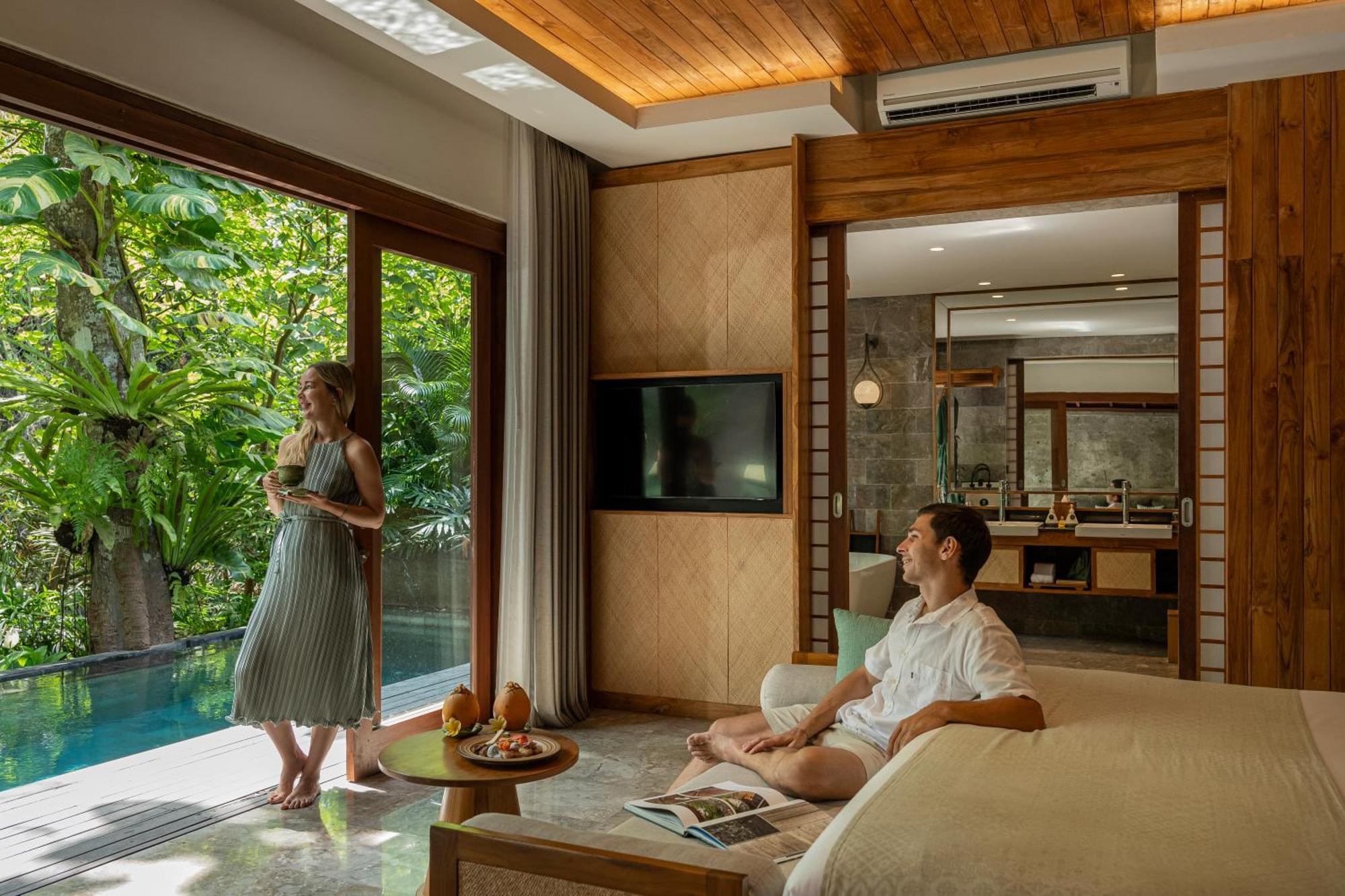 Hotel Adiwana Suweta Ubud Exterior foto A bedroom at the resort